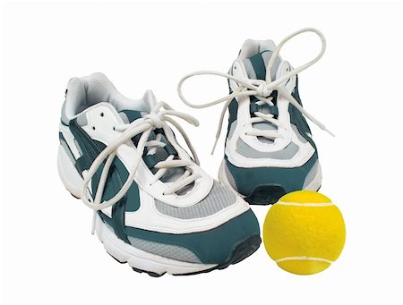 simsearch:400-07922607,k - Concept with sport shoes and tennis ball isolated on the white background Stock Photo - Budget Royalty-Free & Subscription, Code: 400-04740283