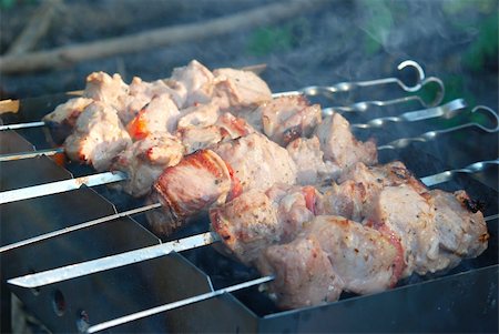 simsearch:400-04587885,k - Juicy slices of meat prepare on fire Stock Photo - Budget Royalty-Free & Subscription, Code: 400-04740328