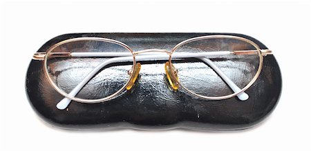 simsearch:400-07774329,k - eyeglasses in black case isolated on white Stock Photo - Budget Royalty-Free & Subscription, Code: 400-04741500