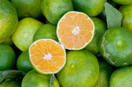 simsearch:400-06513460,k - Green raw tangerines Stock Photo - Budget Royalty-Free & Subscription, Code: 400-04742909