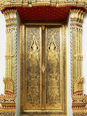 Thai art gold painting on church wood door Bangkok Thailand Stock Photo - Budget Royalty-Free & Subscription, Code: 400-04755787