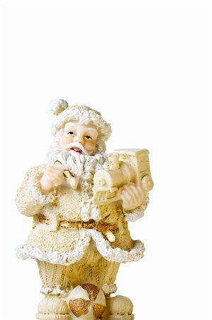 Santa Claus statuette with gifts isolated on white Stock Photo - Budget Royalty-Free & Subscription, Code: 400-04756124