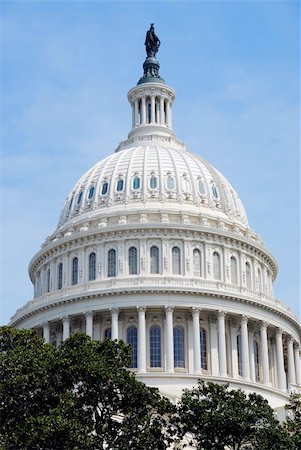 Capitol Hill Building dome closeup with blue sky and trees, Washington DC Stock Photo - Budget Royalty-Free & Subscription, Code: 400-04758274