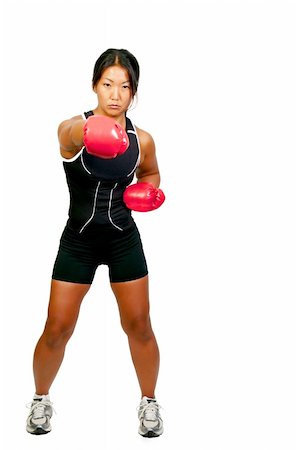 simsearch:400-03984387,k - A beautiful young woman wearing a pair of boxing gloves Stock Photo - Budget Royalty-Free & Subscription, Code: 400-04750973