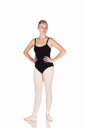 simsearch:400-04119672,k - Young caucasian ballerina girl on white background and reflective white floor showing various ballet steps and positions. Not Isolated Stock Photo - Budget Royalty-Free & Subscription, Code: 400-04751236