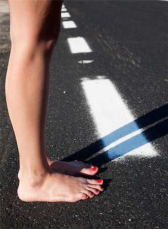 simsearch:400-04016023,k - Close up image Barefoot woman in a road Stock Photo - Budget Royalty-Free & Subscription, Code: 400-04764983
