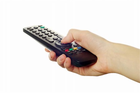 remote control in hand isolated on white background Stock Photo - Budget Royalty-Free & Subscription, Code: 400-04767895