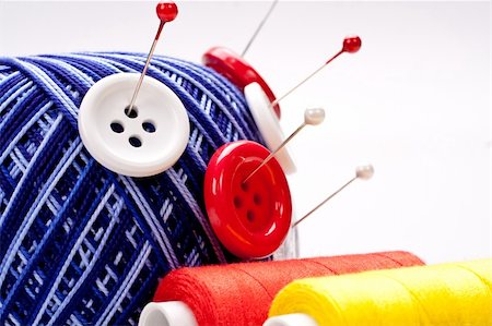 simsearch:400-06079198,k - red and white pins in wool ball with buttons Stock Photo - Budget Royalty-Free & Subscription, Code: 400-04768145