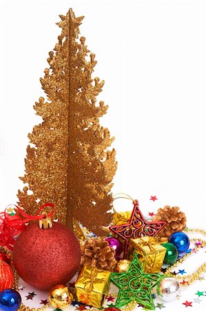 simsearch:400-05381288,k - Colorful Christmas baubles and decorations next to golden tree isolated on white background with copy space. Stock Photo - Budget Royalty-Free & Subscription, Code: 400-04768902