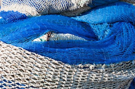 simsearch:400-05254289,k - Closeup of a stack of traditional fishing nets Stock Photo - Budget Royalty-Free & Subscription, Code: 400-04774047
