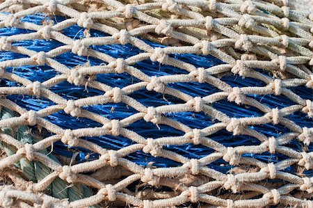 simsearch:6118-08910527,k - Detail take of some traditional fishing nets Foto de stock - Super Valor sin royalties y Suscripción, Código: 400-04774048
