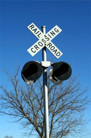 railway track signals - A railroad crossing sign Stock Photo - Budget Royalty-Free & Subscription, Code: 400-04774344