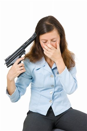 suicide - young woman aiming a gun at his head Stock Photo - Budget Royalty-Free & Subscription, Code: 400-04774606