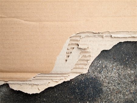 Torn brown cardboard paper on floor Stock Photo - Budget Royalty-Free & Subscription, Code: 400-04774653