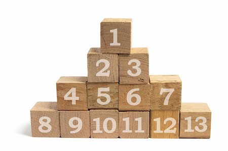 simsearch:600-02346205,k - Stack of Wooden Blocks on White Background Stock Photo - Budget Royalty-Free & Subscription, Code: 400-04775257