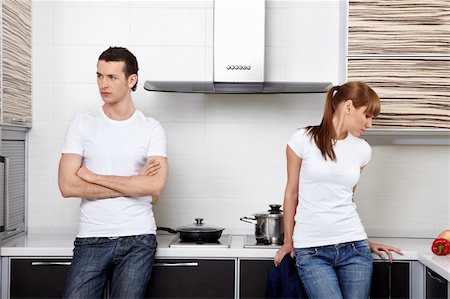 simsearch:400-04902701,k - The young quarrelled couple on kitchen Stock Photo - Budget Royalty-Free & Subscription, Code: 400-04779202