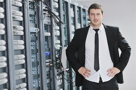 simsearch:400-04239432,k - young handsome business man  engeneer in datacenter server room Stock Photo - Budget Royalty-Free & Subscription, Code: 400-04779231