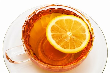 simsearch:400-04273561,k - glass cup with tea and a lemon on a white background Stock Photo - Budget Royalty-Free & Subscription, Code: 400-04771319