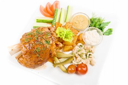 simsearch:400-04684204,k - Tasty pork dish with vegetables on a white background Photographie de stock - Aubaine LD & Abonnement, Code: 400-04772454