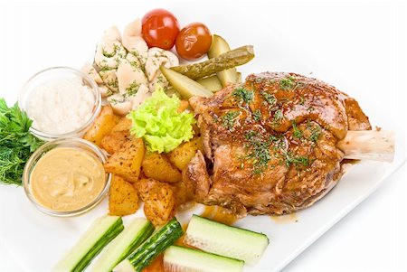 simsearch:400-04684204,k - Tasty pork dish with vegetables on a white background Photographie de stock - Aubaine LD & Abonnement, Code: 400-04772452