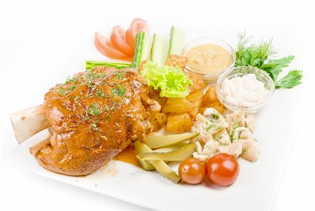 simsearch:400-04684204,k - Tasty pork brisket dish with vegetables on a white background Photographie de stock - Aubaine LD & Abonnement, Code: 400-04772453