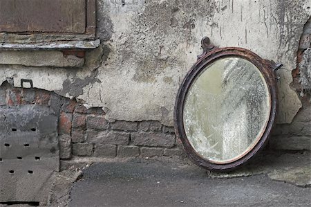 Old Mirror Standing Against Wall Stock Photo - Budget Royalty-Free & Subscription, Code: 400-04784057