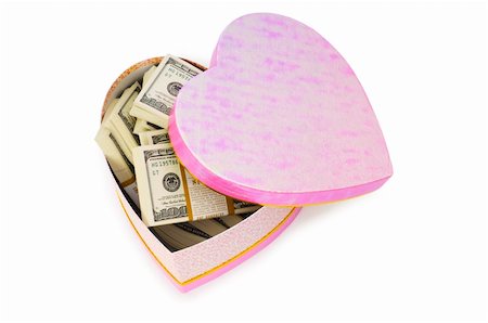 simsearch:400-04408371,k - Heart shaped gift box and dollars inside Stock Photo - Budget Royalty-Free & Subscription, Code: 400-04785400