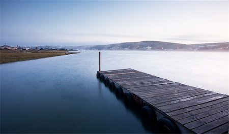 simsearch:400-04756224,k - Sunrise over river and pier with mist in the distance Stock Photo - Budget Royalty-Free & Subscription, Code: 400-04785552