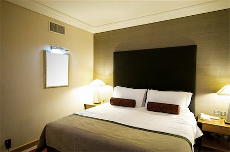 Double bed in the hotel room Stock Photo - Budget Royalty-Free & Subscription, Code: 400-04785874