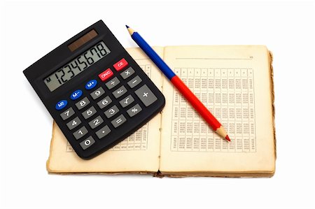 subtracting - calculator with an old book on white background Stock Photo - Budget Royalty-Free & Subscription, Code: 400-04786480