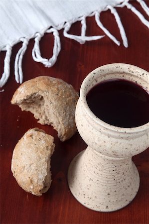 Chalice with red wine and bread. Shallow dof Stock Photo - Budget Royalty-Free & Subscription, Code: 400-04787279