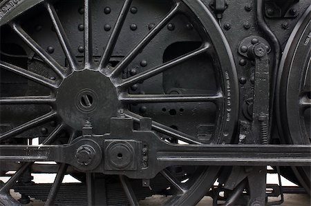 Closeup of vintage steam engine's black, iron wheel Stock Photo - Budget Royalty-Free & Subscription, Code: 400-04787604