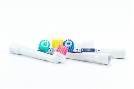 Electric toothbrush head on white Photographie de stock - Aubaine LD & Abonnement, Code: 400-04789855