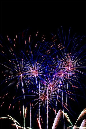simsearch:400-06745167,k - Firework streaks in the night sky Stock Photo - Budget Royalty-Free & Subscription, Code: 400-04780817