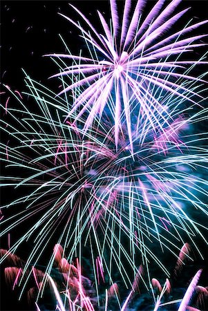 simsearch:400-06745167,k - Firework streaks in the night sky Stock Photo - Budget Royalty-Free & Subscription, Code: 400-04780819