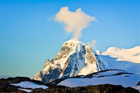 simsearch:400-05271801,k - Beautiful snow-capped mountains against the blue sky in Antarctica Stock Photo - Budget Royalty-Free & Subscription, Code: 400-04781278