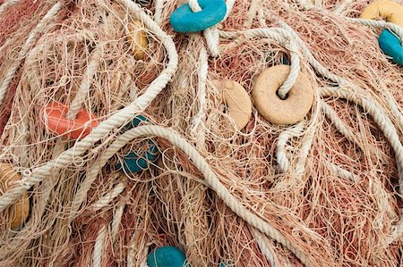 simsearch:6118-08910527,k - Detail  of a colorful stack of trawl fishing nets Stock Photo - Budget Royalty-Free & Subscription, Code: 400-04781473