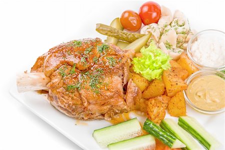 simsearch:400-04684204,k - Tasty pork meat dish with vegetables on a white background Photographie de stock - Aubaine LD & Abonnement, Code: 400-04781680