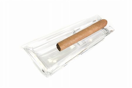 simsearch:400-05207678,k - Cigar at ashtray isolated on a white back Stock Photo - Budget Royalty-Free & Subscription, Code: 400-04781701