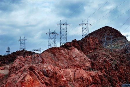 Power transmission tower silhouette over mountain from Hoover Dam at the boarder of Arizona and Nevada. Photographie de stock - Aubaine LD & Abonnement, Code: 400-04782235