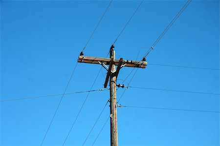 phone pole with land line against a blue sky Stock Photo - Budget Royalty-Free & Subscription, Code: 400-04782405