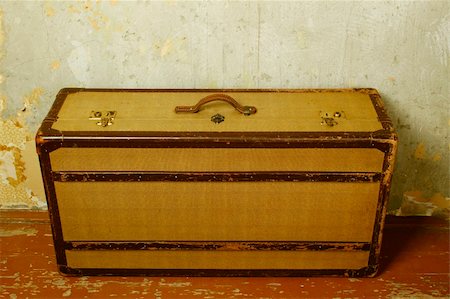 suitcase old - Old-fashioned suitcase standing on the old wooden floor Stock Photo - Budget Royalty-Free & Subscription, Code: 400-04794309