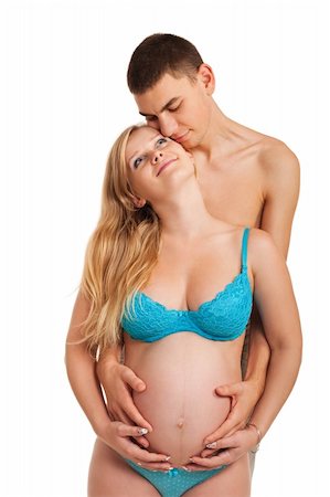 pregnancy nude - Pregnant woman with her husband just happy together. Studio shoot on white. Stock Photo - Budget Royalty-Free & Subscription, Code: 400-04794532