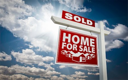 sold sign - Red Sold Home For Sale Real Estate Sign Over Beautiful Clouds and Blue Sky. Stock Photo - Budget Royalty-Free & Subscription, Code: 400-04794776