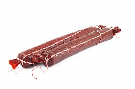 smoked color lines - Two salami sausage isolated on white background Stock Photo - Budget Royalty-Free & Subscription, Code: 400-04795565