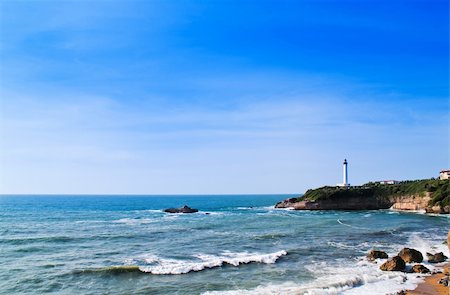 simsearch:400-04272525,k - white lighthouse, blue sky, beacon Stock Photo - Budget Royalty-Free & Subscription, Code: 400-04796975