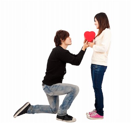 simsearch:400-04739802,k - Asian young Man handing over love gift  to  young woman on Valentine Day .Isolated on white background Stock Photo - Budget Royalty-Free & Subscription, Code: 400-04798036