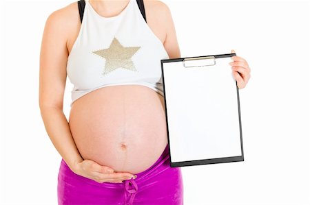 simsearch:400-05716366,k - Pregnant woman holding blank clipboard isolated on white.  Closeup. Stock Photo - Budget Royalty-Free & Subscription, Code: 400-04798379