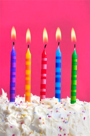 simsearch:400-04658893,k - Close up macro photograph of 5 candles on a birthday cake Photographie de stock - Aubaine LD & Abonnement, Code: 400-04799841