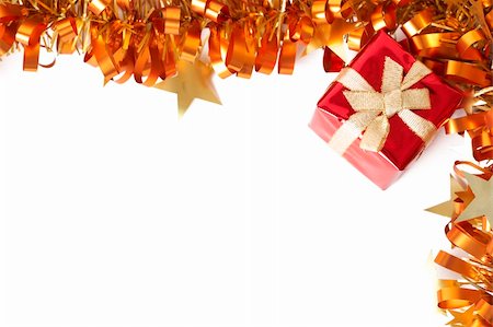 simsearch:400-05381288,k - Red Christmas gift with golden tinsel frame isolated on white background with copy space. Stock Photo - Budget Royalty-Free & Subscription, Code: 400-04790570